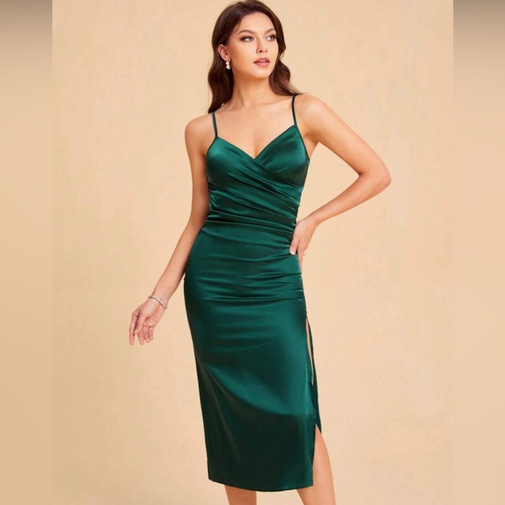 Brand new! Gorgeous satin dress with ruching and side slit. Size 8/10.
